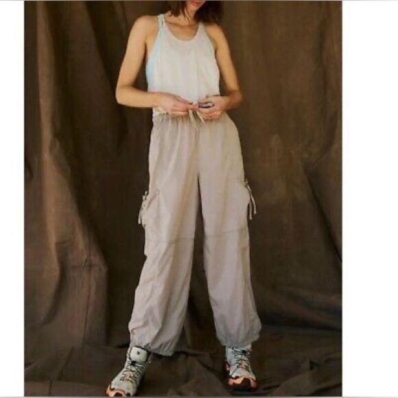 Free People Movement Back Packer Jumpsuit Muted Beige Size Med. NWT - Picture 1 of 11